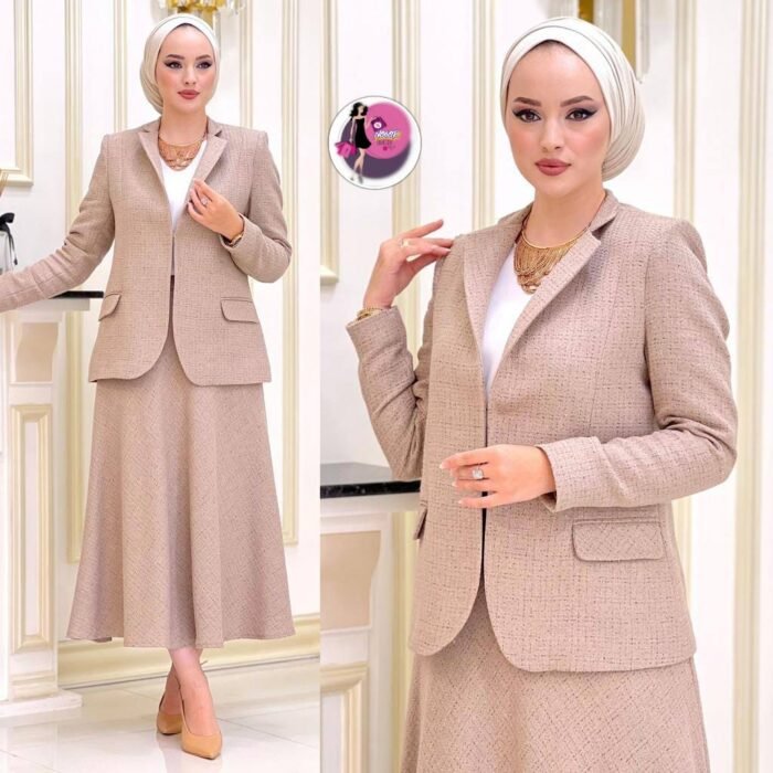 Elegant beige tweed blazer and skirt set, styled with minimalist accessories.